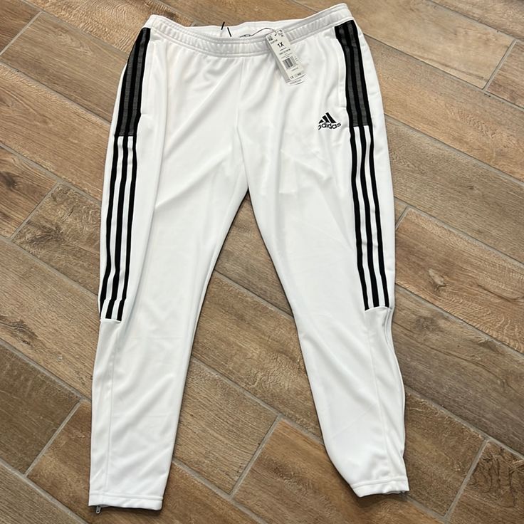 White Looks So Beautiful In Winter! These Are Perfect For Weekends Working Out Or Running Errands! Graphic Pant, Athletic Sweatpants, Slim Fit Joggers, Adidas Three Stripes, Striped Tights, Stripe Pants, Adidas Joggers, Cuffed Joggers, Joggers Track Pants