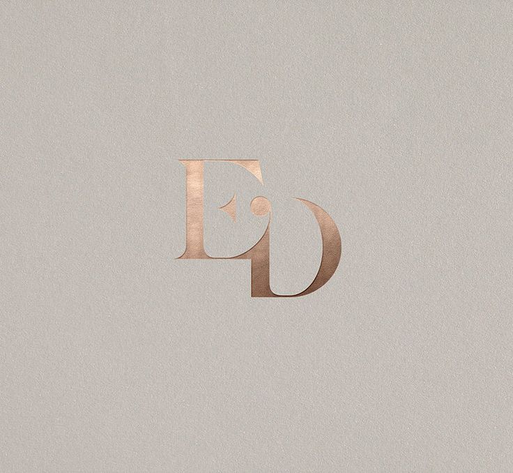 the letter p is made up of gold foil on a light gray background with a shadow