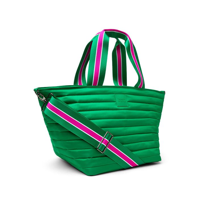 a green handbag with pink, white and blue stripes on the bottom is shown