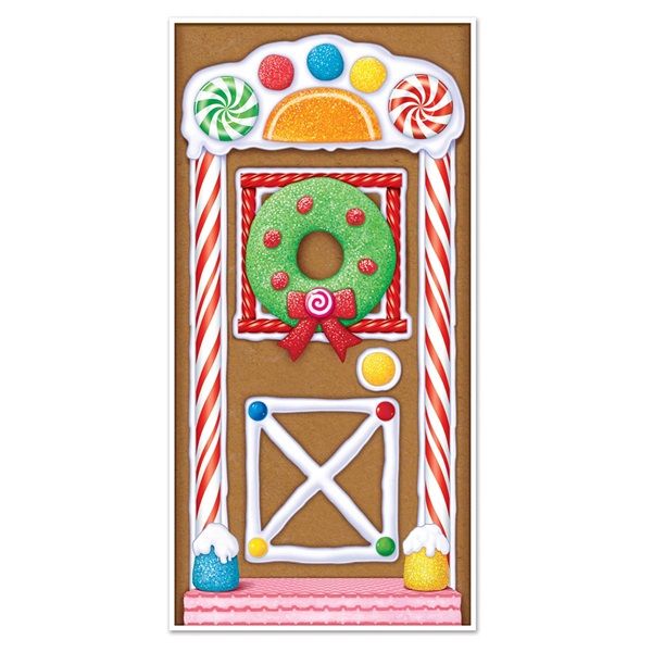 a christmas door decoration with candy canes and a wreath on the front entrance to a gingerbread house