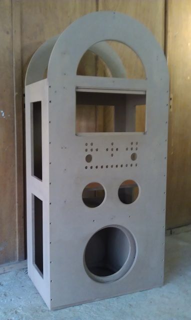 a cement structure with holes in the middle