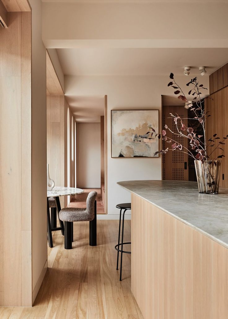 the kitchen is clean and ready to be used as a dining room or living room