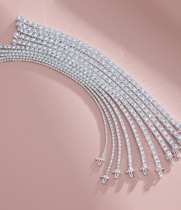 This tennis bracelet is an expression of refined craftsmanship, where quality takes precedence over mass production. Each diamond is thoughtfully hand-selected to achieve a flawless match in color and brilliance, ensuring a radiant and cohesive sparkle that sets this bracelet apart. With 58 expertly cut facets, these full-cut round diamonds reflect light beautifully, showcasing a brilliance that cannot be replicated by mass-produced, single-cut (15 facet alternatives). Created with the utmost care and a commitment to heirloom quality, this piece stands as a true testament to enduring luxury. Ring Enhancer, Wedding Band Designs, Mass Production, Monogram Design, Mens Band, Tennis Bracelet Diamond, Anniversary Bands, Pendant Design, Designer Engagement Rings