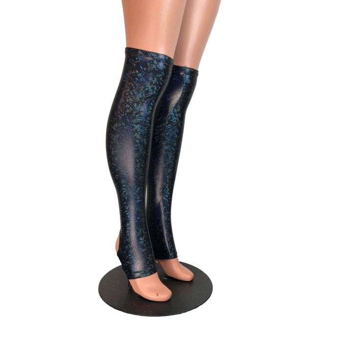 Stunning black shattered glass holographic spandex calf or leg sleeves with stirrup bottoms. These leg warmers come up just over the knee with elastic to hold them in place. The stirrup bottoms are cut perfectly to fit your heels with no seam under your foot. Black Footless Legwear For Party, Black Footless Party Legwear, Trendy Black Leg Warmers For Party, Black Thigh High Leg Warmers For Party, Black Full-length Legwear For Party, Trendy Fitted Leg Warmers For Party, Black Full-length Party Legwear, Full Length Black Legwear For Party, Black Full Length Party Legwear