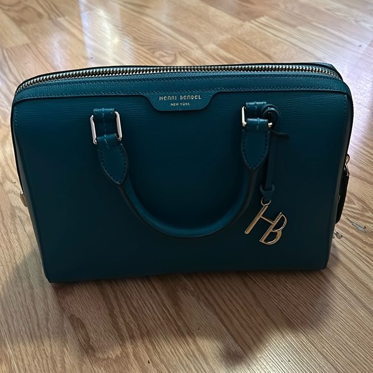 Turquoise Bag With Detachable Strap. Luxury Turquoise Top Handle Bag, Luxury Turquoise Travel Bags, Turquoise Rectangular Bag With Detachable Strap, Turquoise Top Handle Travel Bag, Rectangular Turquoise Bag With Detachable Strap, Elegant Turquoise Bag With Removable Pouch, Turquoise Travel Bag With Detachable Strap, Elegant Turquoise Bag For Formal Occasions, Turquoise Top Handle Shopping Bag