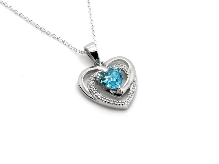 Sterling Silver Heart Pendant with Blue and Clear Cubic Zirconia Necklace, CZ Love Jewelry Blue Heart Cut Necklace For Anniversary, Blue Heart Pendant Necklace For Anniversary, Light Blue Birthstone Necklace For Anniversary, Light Blue Pendant Necklace For Anniversary, Blue Heart Necklace With Charm For Anniversary, Light Blue Jewelry For Valentine's Day Gift, Blue Cubic Zirconia Heart Pendant Jewelry, Blue Heart Pendant Necklace With Birthstone, Blue Birthstone Heart Pendant Necklace