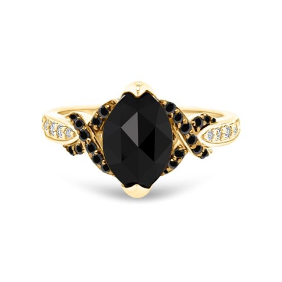 a black diamond ring with white diamonds on the sides and an oval cut stone in the middle