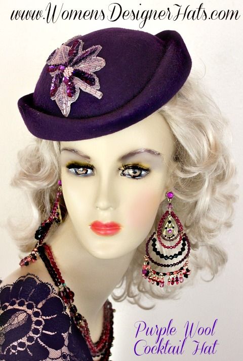 Ladies Purple Custom Made Winter Wool Pillbox Designer Fashion Hat. This Elegant Ladies Hat Is Inspired By The 1920s Flapper And Art Deco Hats. This Dress Hat Is Trimmed With A Pearl And Light Purple Lavender Sequin Beaded Pearl Flower Applique.

This dress hat is suited for Winter, And Fall.

Material: Purple Wool
Head Size: 22.5 Inches - Shallow Crown Hat, A Hat Pin Is Included To Secure This Hat On Your Head
Crown Width: 7 Inches

This Women's Hat Is Suited For Cocktail Parties, Weddings, Holidays, Formals, The Kentucky Derby, And Special Occasions. Weddings And Formals. Women's Designer Hats Specializes In Custom Made Designer Hats For Women, Cocktail Hats, Church Hats, Hats For Formals, Dress Hats, Hats For Weddings, Kentucky Derby Hats, Hats For Horse Racing Events, And Special Occas Art Deco Hats, Special Occasion Hats, Mother Of The Bride Hats, Head Crown, Royal Ascot Hats, Occasion Hats, Couture Hats, Women Church, Hat Wedding