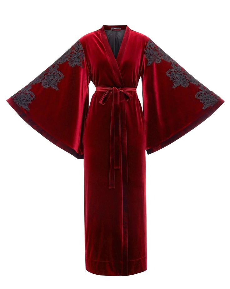 Velvet robe with silk and satin blend lining. Ankle length, wrap-over style, lace embellished sleeves, with two sets of inside ties. One tie is included. Material Composition: polyester 95%, elastane 5% Luxury Long-sleeved Traditional Robe, Bridesmaid Robe Burgundy, Velvet Robe Dress, Luxury Long Red Robe, Luxury Festive Burgundy Sets, Burgandy Bridesmaids Robes, Fancy Winter Robes, Luxury Red Ceremonial Kimono, Luxury Lavender Traditional Drape Wear