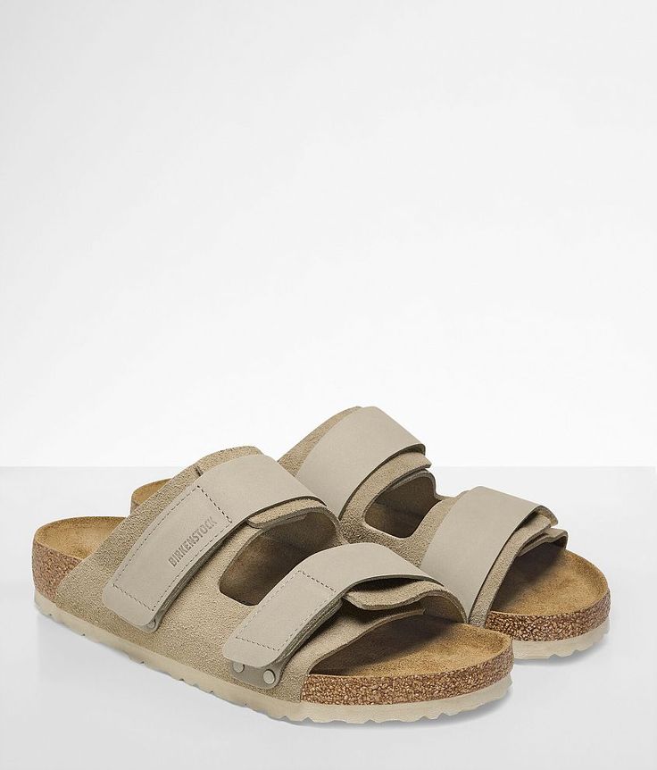 Birkenstock® Uji Suede Sandal - Brown US 11, Women's Taupe Double nubuck leather hook and latch strap sandal Contoured cork-latex suede lined footbed Flexible EVA sole. Due to the nature of leather/suede, small variances of color in the skin may occur, this is in no way considered a defect. These are inherent characteristics of leather/suede and will enhance the individual look of your garment.. Upper: Suede/Nubuck Leather. EVA sole.. WOMEN'S BIRKENSTOCK CONVERSION CHART U.S. Size Birkenstock Si Beige Leather Sandals With Cushioned Footbed, Casual Footbed Sandals With Suede Lining And Round Toe, Beige Leather Footbed Sandals With Cushioned Sole, Comfortable Suede Sandals With Buckle Closure, Beige Leather Cushioned Footbed Sandals, Suede Footbed Sandals With Adjustable Strap And Round Toe, Suede Footbed Sandals With Adjustable Strap, Double Strap Footbed Sandals With Textured Footbed For Outdoor, Outdoor Suede Sandals With Textured Footbed