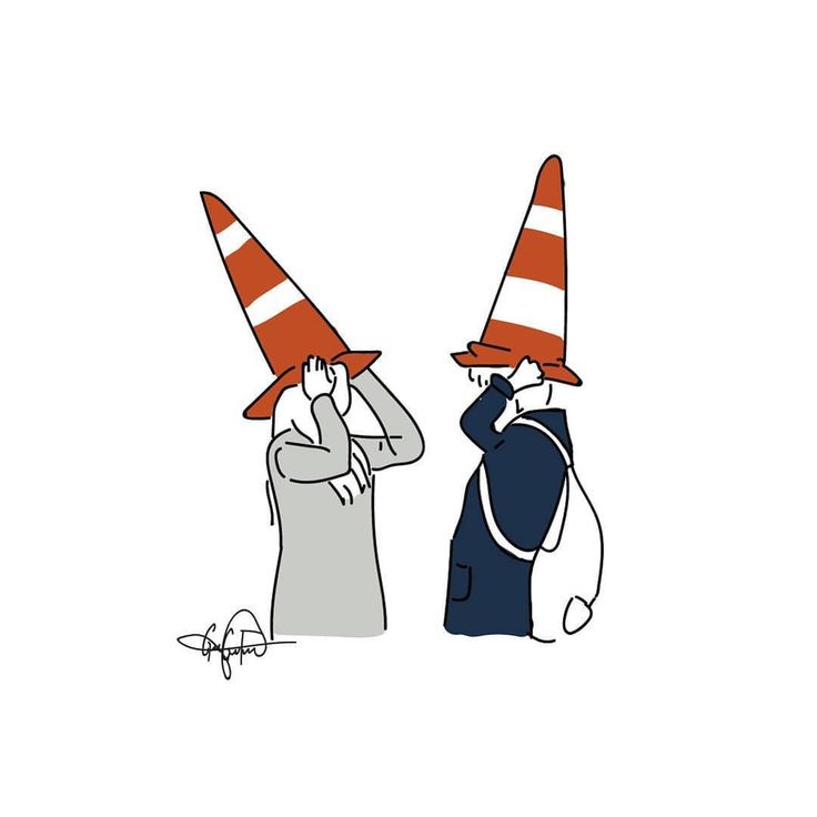 two people with red and white hats on their heads