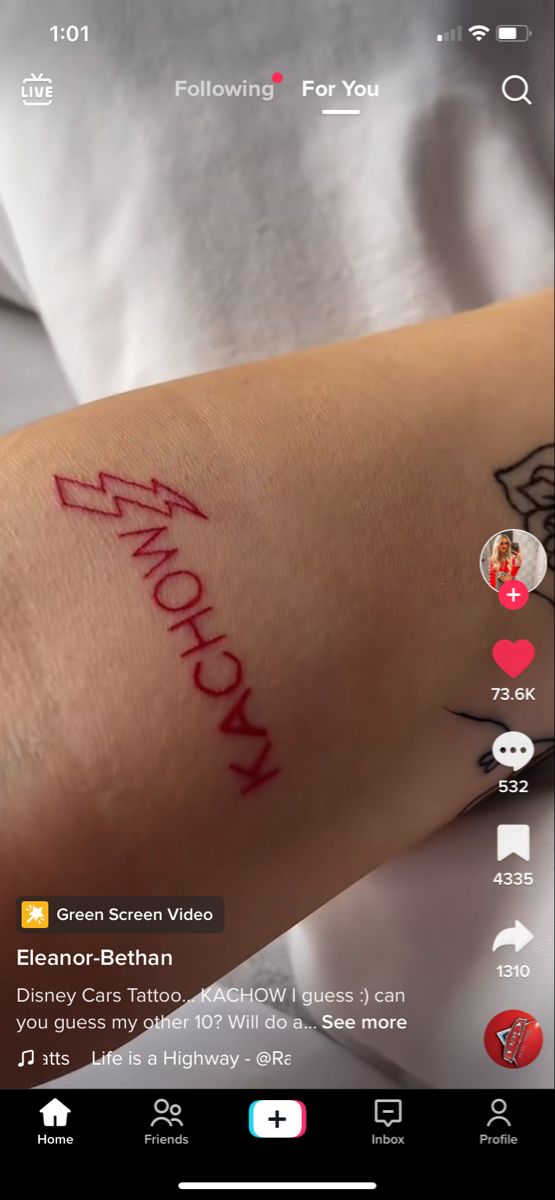 a person with a tattoo on their arm