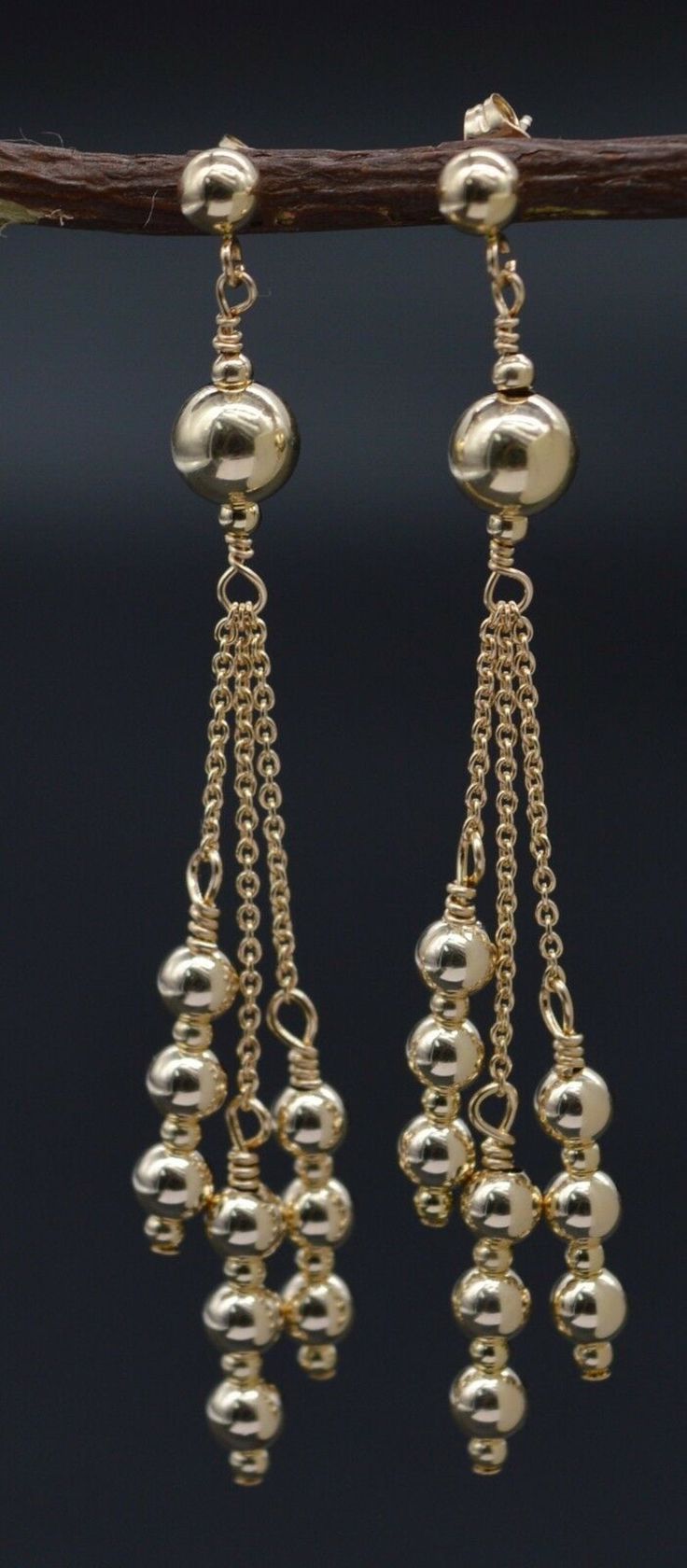 New 14K Solid Yellow Gold Round Triple Bead Drop/Dangle Earrings fit all periods and are indefectible for diurnal wear to completely parade your style and make you beautiful. This real 14k Gold earring makes a novelettish surprise for any stupendous lady. Great gifts for Mama or Grandma on Mother's Day, anniversary, birthday, or marriage festivity. Specifications: New 14K Solid Yellow Gold Round Triple Bead Drop/Dangle Earrings These earrings sway with playful movement and shine. High Polished 1 14k Gold-filled Beaded Dangle Earrings, 14k Gold-filled Dangle Beaded Earrings With Gold Beads, 14k Gold Filled Dangle Beaded Earrings With Gold Beads, Dangle Beaded Earrings With 14k Gold Filled, Gold Dangling Bead Jewelry, Gold Dangling Bead Earrings, Gold Dangle Jewelry With Beads, Gold Dangle Jewelry With Dangling Beads, Gold Chandelier Earrings With Gold Beads