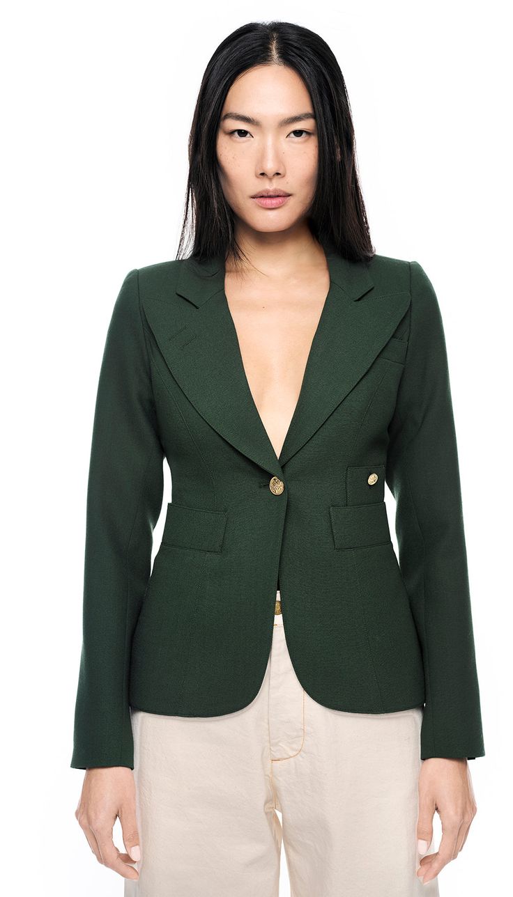 Style Notes: This blazer is quintessentially SMYTHE: refined and perfectly tailored. This timeless classic has been a SMYTHE staple since 2011.Details: Decidedly tailored and one of our top selling silhouettes, this single-breasted blazer features a “cheeky” cut out back vent and brass hardware. Curvy figures may wish to go up a size.Color: ForestSize: Model is 5'11" and is wearing a size 2. Please use the Size Guide to determine your size.Content + Care: 100% Wool. Lining: 100% Cupro Rayon. Dry Classic Fitted Tweed Jacket, Classic Tailored Tweed Jacket With Pressed Crease, Elegant Notched Blazer With Double Button Closure, Classic Structured Office Sport Coat, Timeless Fitted Blazer, Luxury Fitted Tweed Jacket With Suit Collar, Timeless Blazer With Lapel Collar And Hidden Button Closure, Fitted Single Button Tweed Jacket With Lapel Collar, Elegant Sport Coat With Double Button Closure