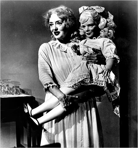 an old black and white photo with a woman holding a baby in her arms while the caption reads, show me on the doll where you switched slowly into an existent despair and lost all