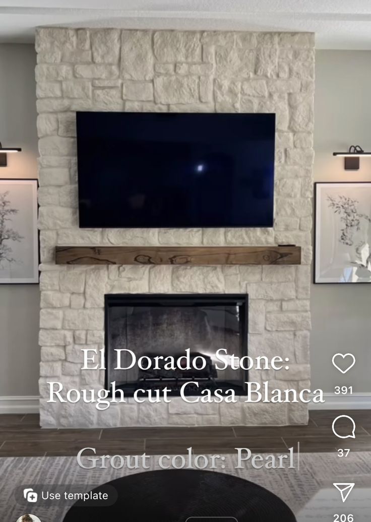 a fireplace with a flat screen tv mounted on it's wall and the words el dora stone rough cut case blanea