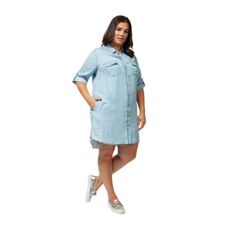 Classic denim shirtdress that emulates instant casual style. Spread collar Long sleeves with buttoned cuffs Front button placket High-low hem Tencel Machine wash Imported SIZE & FIT About 38.5" from shoulder to hem Diva Boutique, Boutique Stores, Denim Shirt Dress, Shirtdress, High Low Hem, Button Placket, Denim Shirt, Plus Size Dresses, Casual Style