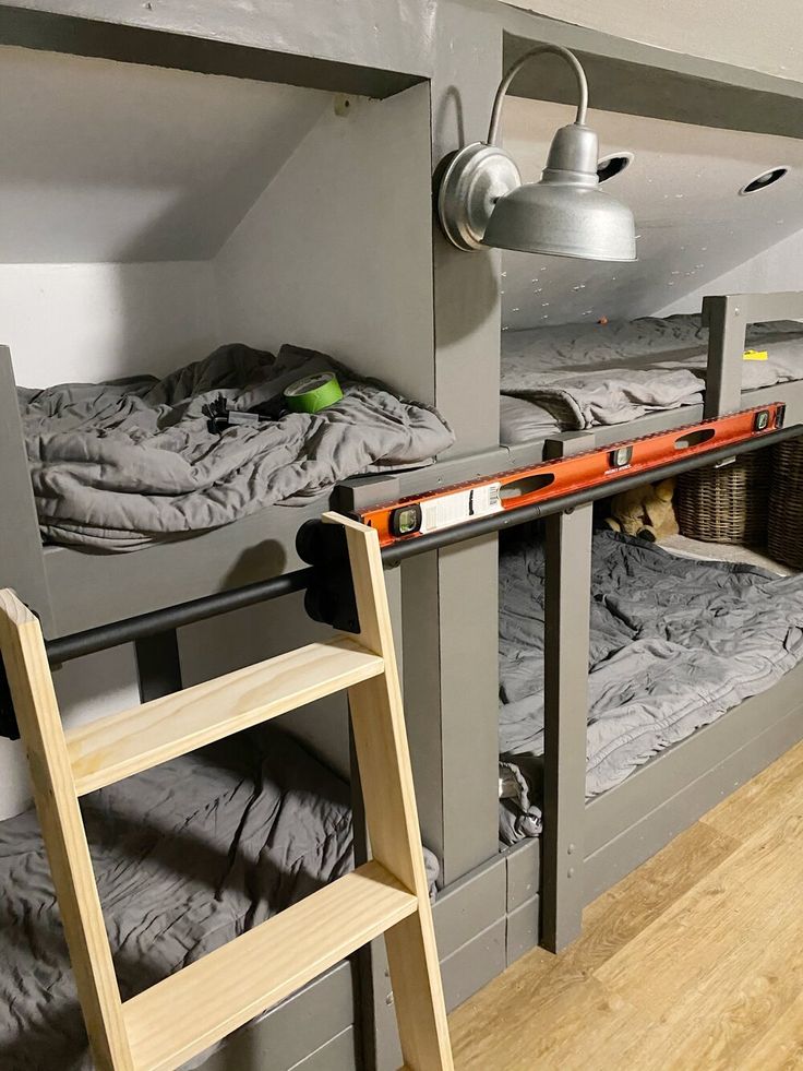 the bunk beds are made up and ready to be slept in