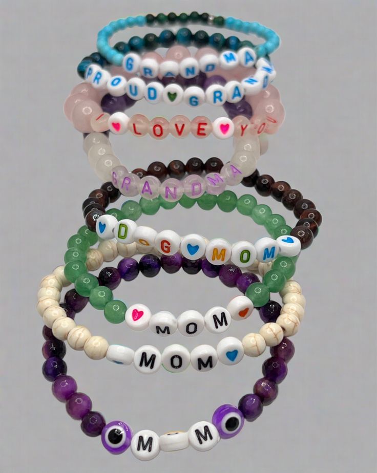 Celebrate the special bond between mother and child with our Mother's Day Bracelet! Made with 6mm or 8mm gemstone beads, this bracelet is a perfect way to show your love and appreciation. Give a meaningful gift that will be cherished for years to come. Mother's Day Adjustable Bracelets With 8mm Beads, Mother's Day Beaded Bracelet With 8mm Beads, Friendship Bracelets For Mother's Day With Round Beads, Spiritual Beaded Bracelets For Friendship On Mother's Day, Beaded Bracelets With 8mm Beads For Mother's Day, Mother's Day Green Beaded Bracelets With Round Beads, Adjustable 8mm Beads Bracelets For Mother's Day, Spiritual Name Bracelet For Mother's Day, Mother's Day Gift Stretch Bracelet With 8mm Beads