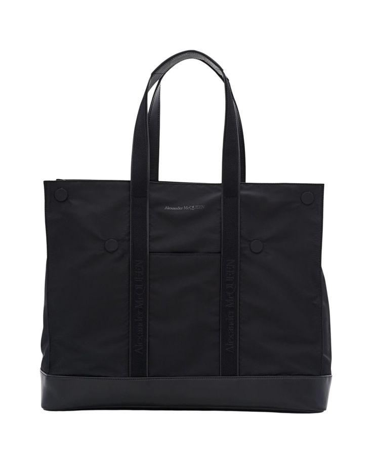 This spacious tote bag from Alexander McQueen is crafted for modern convenience. A secure zip closure ensures your belongings are safe, while double leather handles and a detachable leather strap provide versatile carrying options, blending style with practicality.

- Secure zip closure  
- Double leather handles  
- Detachable leather strap  
- Spacious design Designer Black Briefcase With Detachable Handle, Designer Black Briefcase With Double Handle, Designer Black Double Handle Briefcase, Modern Business Shoulder Bag, Black Business Satchel With Handles, Black Briefcase With Detachable Handle, Luxury Black Bag With Round Handle, Designer Black Satchel With Leather Handles, Black Top Handle Briefcase With Detachable Handle