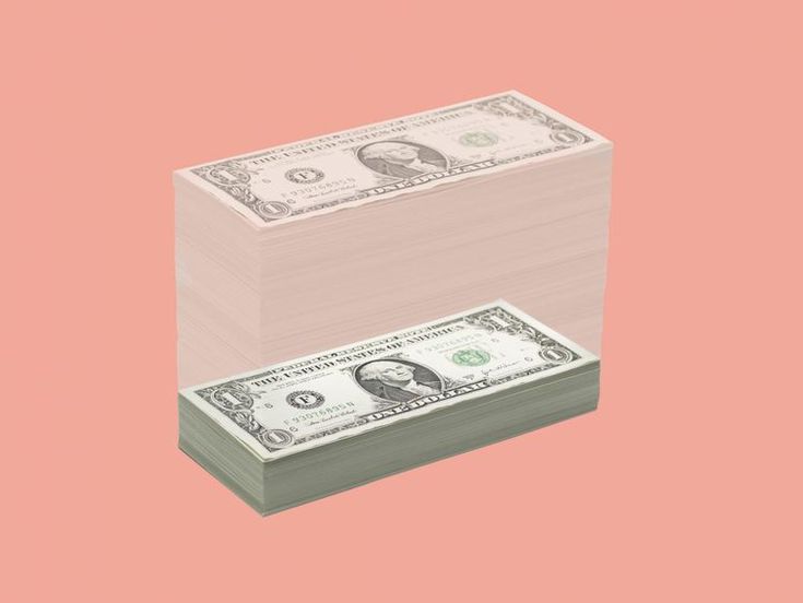 two stacks of one hundred dollar bills sitting on top of each other in front of a pink background