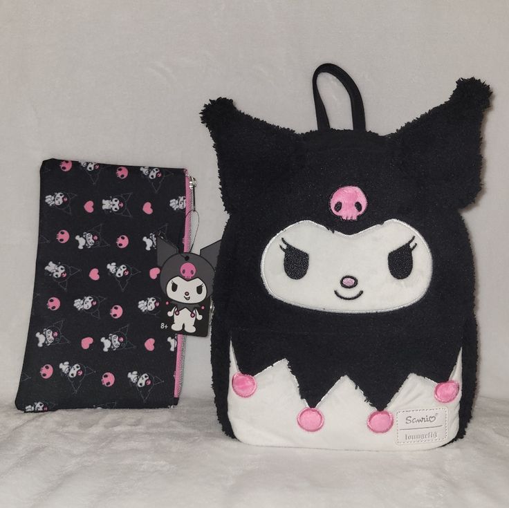 Price Is Firm. Please Do Not Make Any Offers Unless Bundled With Other Items With A Reasonable Offer. Loungefly Kuromi Mini Backpack. Sweet And Mischievous, Kuromi Is The Perfect Travel Companion! This Mini Character Backpack Consists Of A Black Sherpa Body And Fuzzy Embroidered Details On Kuromi With Her Ears In 3d. Features A Faux Leather Bottom And Adjustable Straps, Inner Drop Pocket And Silver Tone Hardware. Approx: 8" X 4 1/4" X 11" Loungefly Kuromi Poses Makeup Bag. Look As Cute As Kuromi Black Pouch Backpack For School, Cute Black Shoulder Bag Backpack, Back To School White Bag With Zipper Pouch, Cute Black Bag With Removable Pouch, Cute Black Zipper Pouch Bag, Cute Black Bag With Zipper Pouch, Black Backpack With Dust Bag For School, Kuromi Loungefly, My Little Pony Backpack