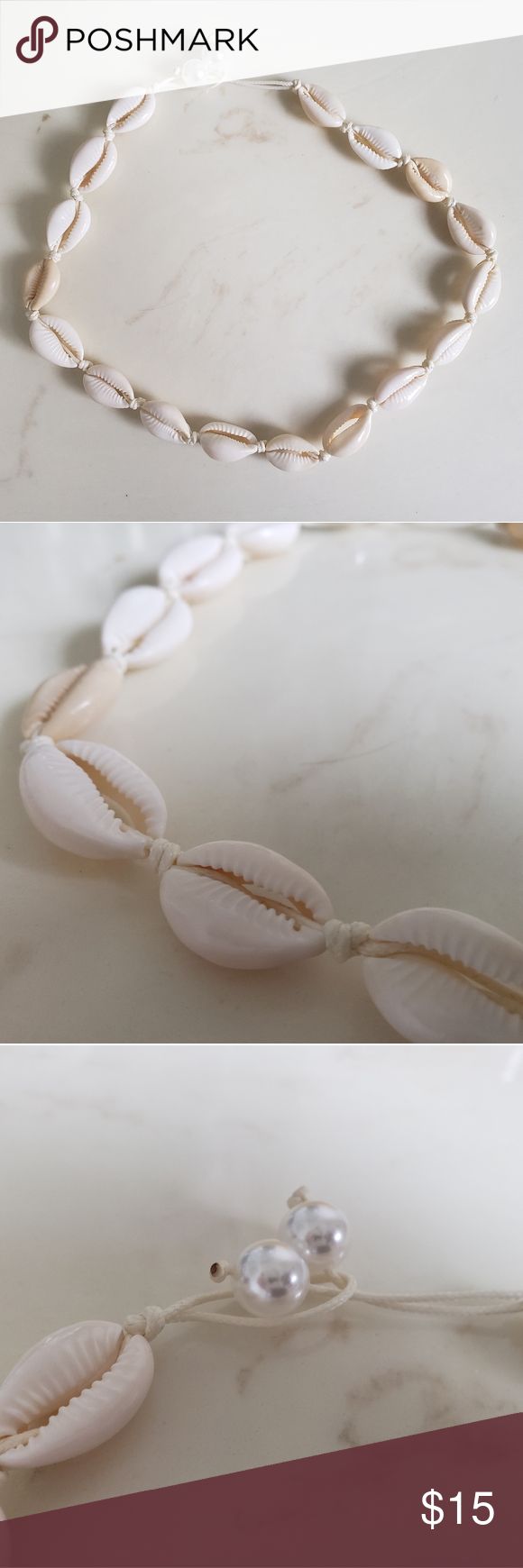 Puka shell necklace Puka shell necklace Pearl clasps in back Never worn Jewelry Necklaces Elegant White Strand Jewelry, White Strand Shell Necklace Gift, White Shell Strand Necklace For Summer, White Strand Shell Necklace As Gift, White Strand Shell Necklace For Summer, Handmade White Strand Jewelry, White Handmade Strand Jewelry, White Strand Jewelry Gift, White Strand Jewelry As Gift