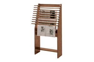 a wooden magazine rack with newspaper on it