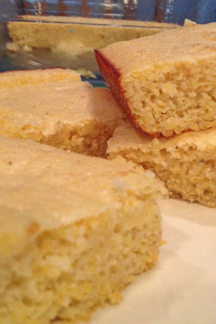 several pieces of cornbread sitting on top of a plate