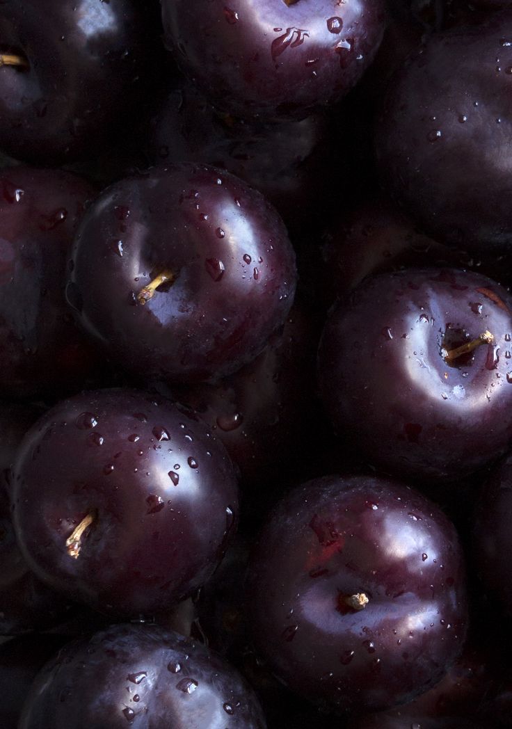 the plums have been soaked with water and are ready to be eaten