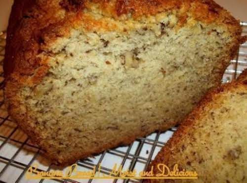 a loaf of banana bread sitting on top of a cooling rack