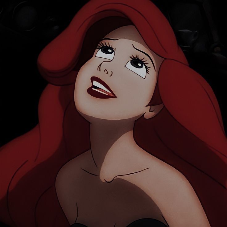 ariel from the little mermaid with red hair and blue eyes, looking up at something