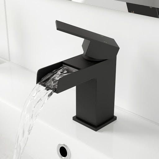 a black faucet with water running from it