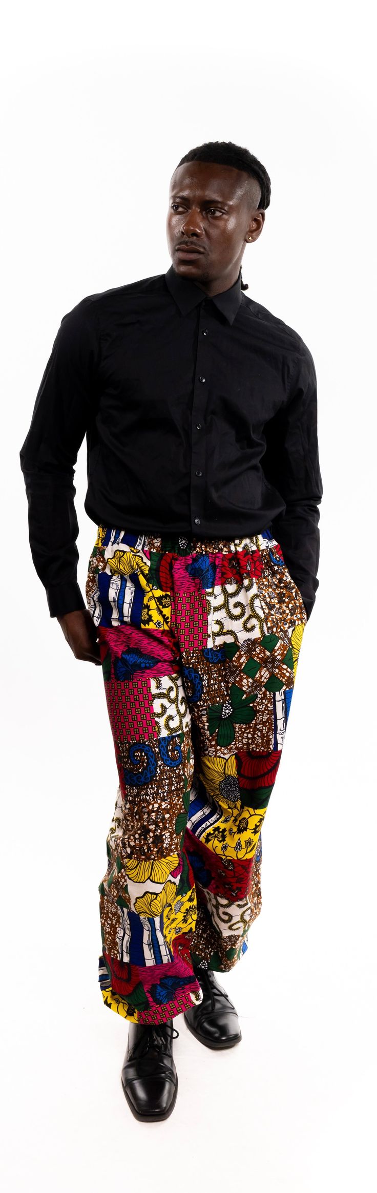 PRODUCT DETAILS: Designed in the U.S., hand-crafted in Africa Delivery within 2 weeks Multiple prints available These medium-rise African print pants are designed with African fabric. They feature a fitted design to embrace your silhouette with comfortable material. The straight-legged pants sit securely below the waist and are tight at the ankles for a stylish look. Look for the perfect color to match your next event and show off a casual finesse. Can be worn as evening wear to various events s Printed Cotton Ankle-length Pants, Multicolor Printed Straight Leg Pants, Multicolor Wide Leg Bottoms With Abstract Print, Multicolor Abstract Print Wide Leg Bottoms, Printed Relaxed Fit Straight Leg Pants, Relaxed Fit Straight Leg Printed Pants, Stretch Cotton Printed Pants, Patterned Relaxed Fit Bottoms With Elastic Waistband, Stretch Cotton Pants With Print