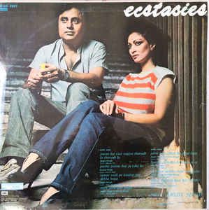 an album cover with a man and woman sitting next to each other