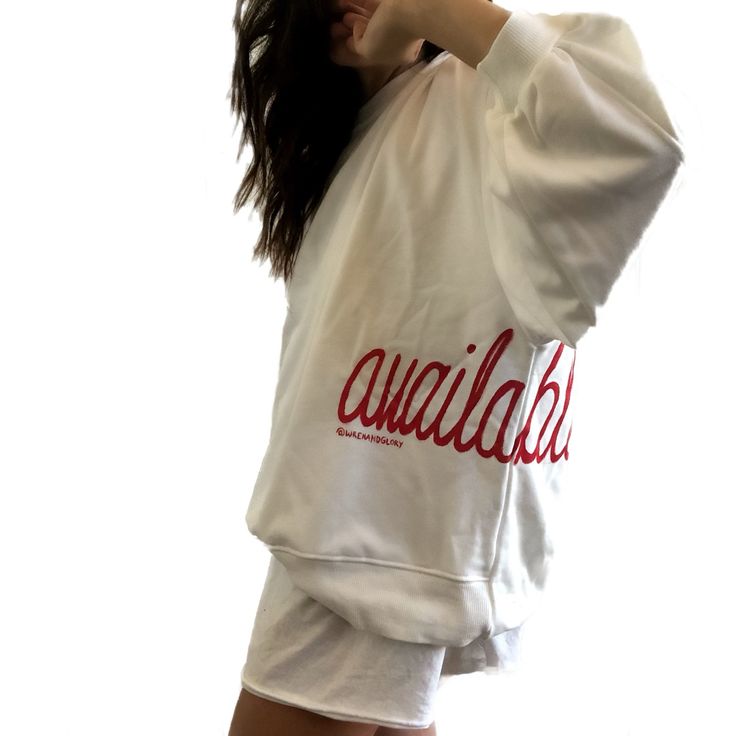 Oversized white sweatshirt. 'Available' painted in script on lower left side, in red. Small red embroidered heart on each lower sleeve. Signed @wrenandglory. Oversized White Letter Print Sweats, White Oversized Sweats With Letter Print, White Letter Print Sweater For Spring, White Crew Sweater With Ribbed Cuffs, White Crew Neck Sweater With Ribbed Cuffs, White Sporty Sweater With Ribbed Cuffs, Sporty White Sweater With Ribbed Cuffs, White Cotton Sweats With Letter Print, White Crew Neck Casual Sweats