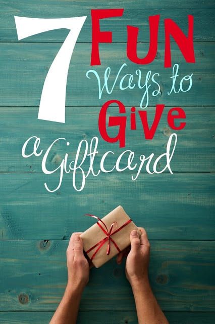 a person holding a wrapped present with the words 7 fun ways to give a gift card