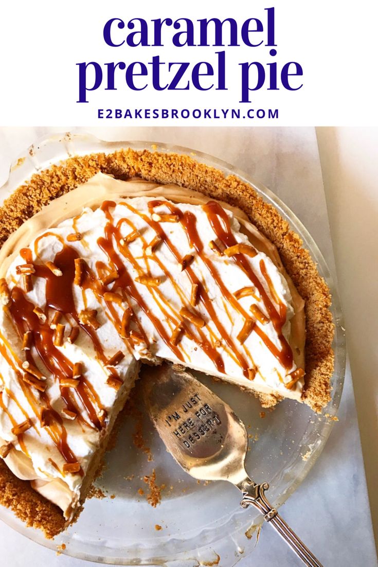 a pie with caramel drizzled on top and a slice missing from it