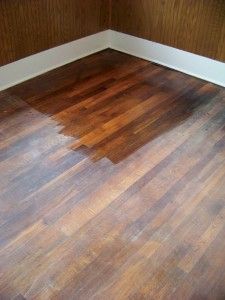 an empty room with hard wood flooring in it