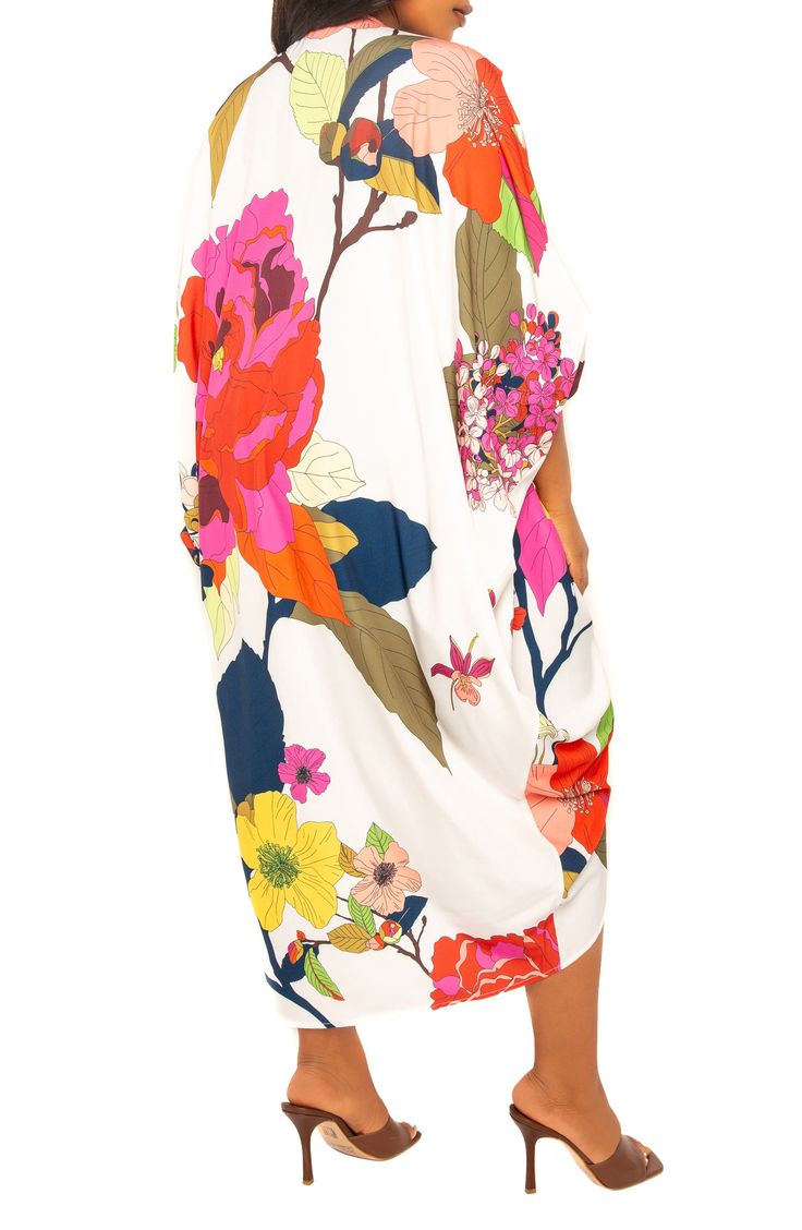 Enter the tropics everytime you slip into this vivid floral dress boasting a billowy caftan silhouette that's fit for your next paradise venture. V-neck Bracelet-length sleeves Unlined 95% polyester, 5% spandex Hand wash, line dry Imported Neck Bracelet, Bold Floral Print, Maxi Sundress, Designer Drapes, Caftan Dress, Long Shirt Dress, Kaftan Dress, Long Sleeve Shirt Dress, Ruched Dress