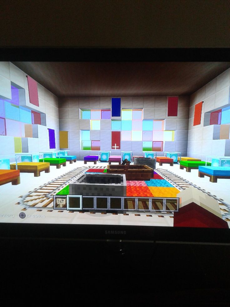 a television screen showing a room with colorful squares on it