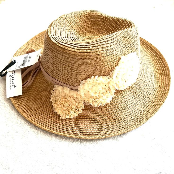 Nwt August Hat Co.Tan Hat With Flower Semi Floppy Casual Flower Hat For Vacation, Casual Flower-shaped Hats For Vacation, Cream Flat Brim Sun Hat For Spring, Beige Flat Brim Hat For Spring, Brown Sun Hat With Short Brim For Spring, Spring Beige Fedora With Curved Brim, Brown Short Brim Sun Hat For Spring, Casual Spring Sun Hat With Flower Shape, Spring Summer Straw Hat With Flower Shape