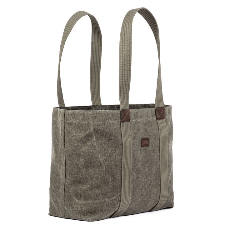 A classic canvas tote is the most convenient way to carry all your day-trip items whether you’re when on a road trip or an exotic vacation. The simple open-top access keeps everything within easy reach, while an interior pouch keeps your small items organized. Plus, the bag stands up on its own so it’s easy to load. Beyond basic functionality, the Retrospective Tote offers a classic cotton canvas look that is soft and conforming to the body, yet so durable it will last for countless outings to c Coated Canvas Bag With Reinforced Handles For Everyday Use, Everyday Coated Canvas Bag With Reinforced Handles, Canvas Shoulder Bag With Reinforced Handles For Everyday Use, Everyday Canvas Shoulder Bag With Reinforced Handles, Everyday Canvas Bag With Reinforced Handles, Large Capacity Duck Canvas Bag For On-the-go, Practical Duck Canvas Bags For Everyday Use, Everyday Bag With Reinforced Handles In Waxed Canvas, Waxed Canvas Bag With Canvas Lining For On-the-go