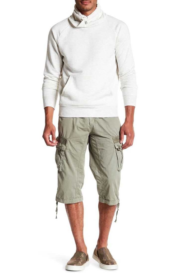 Style an on-trend look in cargo shorts crafted from breathable cotton for comfort during casual outings. 18" inseam; 10" front rise (size 32) Zip fly with button closure 100% cotton Machine wash, tumble dry
 Imported Model stats: 6'1" height, 32" waist. Model is wearing size 32. Casual Relaxed Fit Cargo Pants With Built-in Shorts, Casual Khaki Bermuda Shorts, Casual Bermuda Shorts In Khaki, Casual Bermuda Khaki Shorts, Relaxed Fit Cotton Cargo Shorts With Side Pockets, Cotton Cargo Shorts With Side Pockets And Relaxed Fit, Spring Khaki Cargo Shorts With Pockets, Spring Cargo Style Knee-length Shorts, Khaki Cotton Bermuda Shorts With Side Pockets