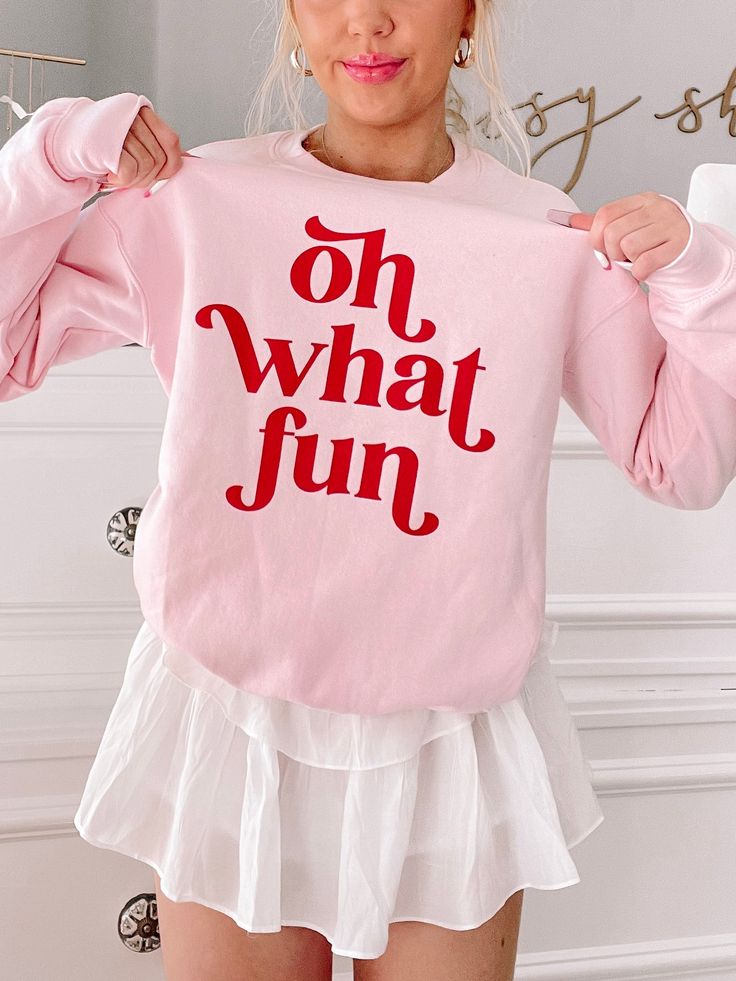 Our Oh What Fun Crewneck is a light pink crew neck with a soft fleece lining on the inside of the sweatshirt. "Oh What Fun" is written in red on the front side. fit : True to size, model wearing a size small Sassy Shortcake, Fancy Fits, Oh What Fun, Wallet Minimalist, Christmas Crewneck, Mens Wallet, Pink Crewneck, Thanksgiving Gift, Minimalist Wallet