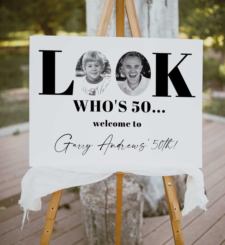 a sign that says look who's 50 welcome to