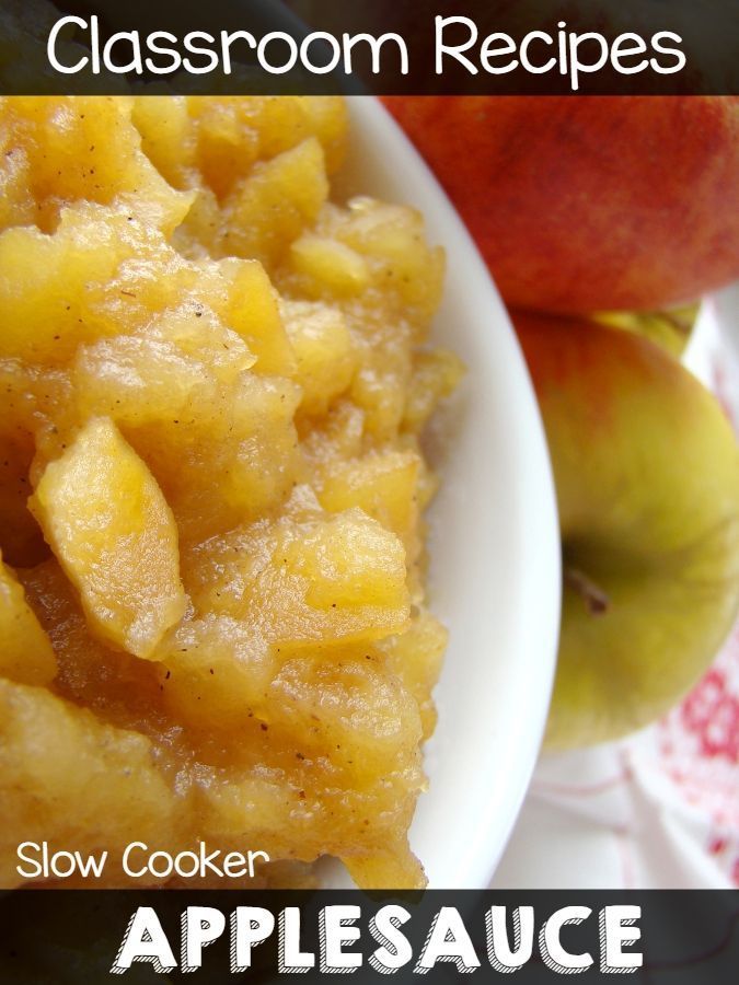 a close up of a plate of food with apples in the background and text that reads slow cooker apple sauce