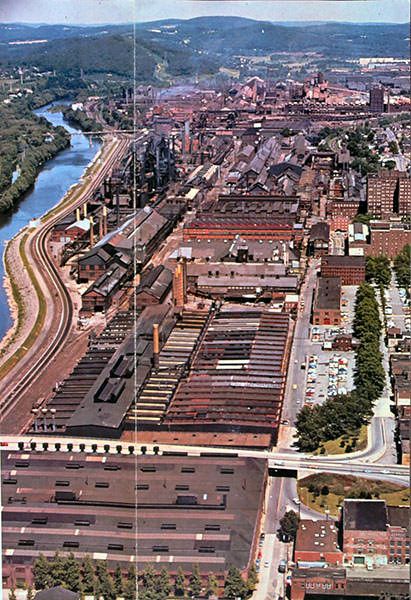 an aerial view of a city and river