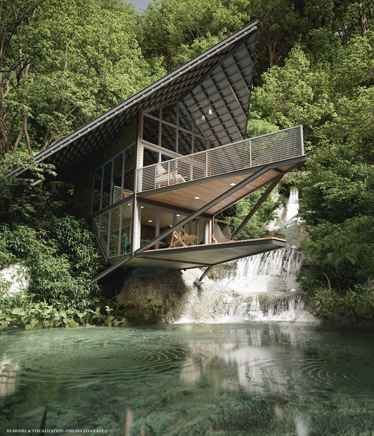 a house built into the side of a waterfall