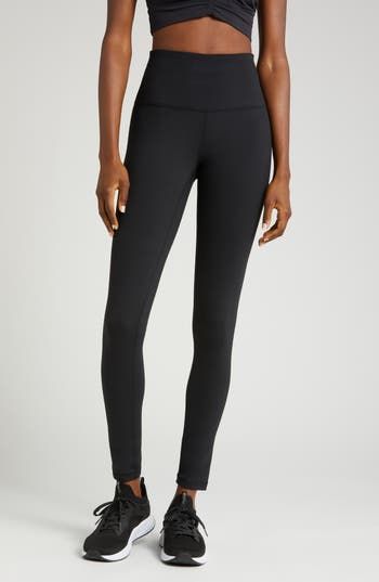 The moisture-wicking tech of stretchy, brushed Zeltek fabric keeps you cool as your workout warms up in these leggings topped with a high, slip-free waistband. 29" inseam; 8 1/2" leg opening;  (size Medium) Elastic waistband with hidden pocket Brushed, moisture-wicking fabric dries quickly to keep you cool and comfortable Smooth flatlock seaming designed to eliminate rubbing and irritation 88% polyester, 12% spandex Machine wash, tumble dry Imported Full Length Tight Elastane Activewear, Micro-elastic Sporty Running Leggings, Sporty Micro-elastic Leggings For Running, Fitted Elastane Leggings For Running, Functional Full-length Stretch Activewear, Fitted Go-dry Functional Leggings, Functional Fitted Go-dry Leggings, Sporty Full-length 4-way Stretch Leggings, Sporty Full-length Leggings With 4-way Stretch